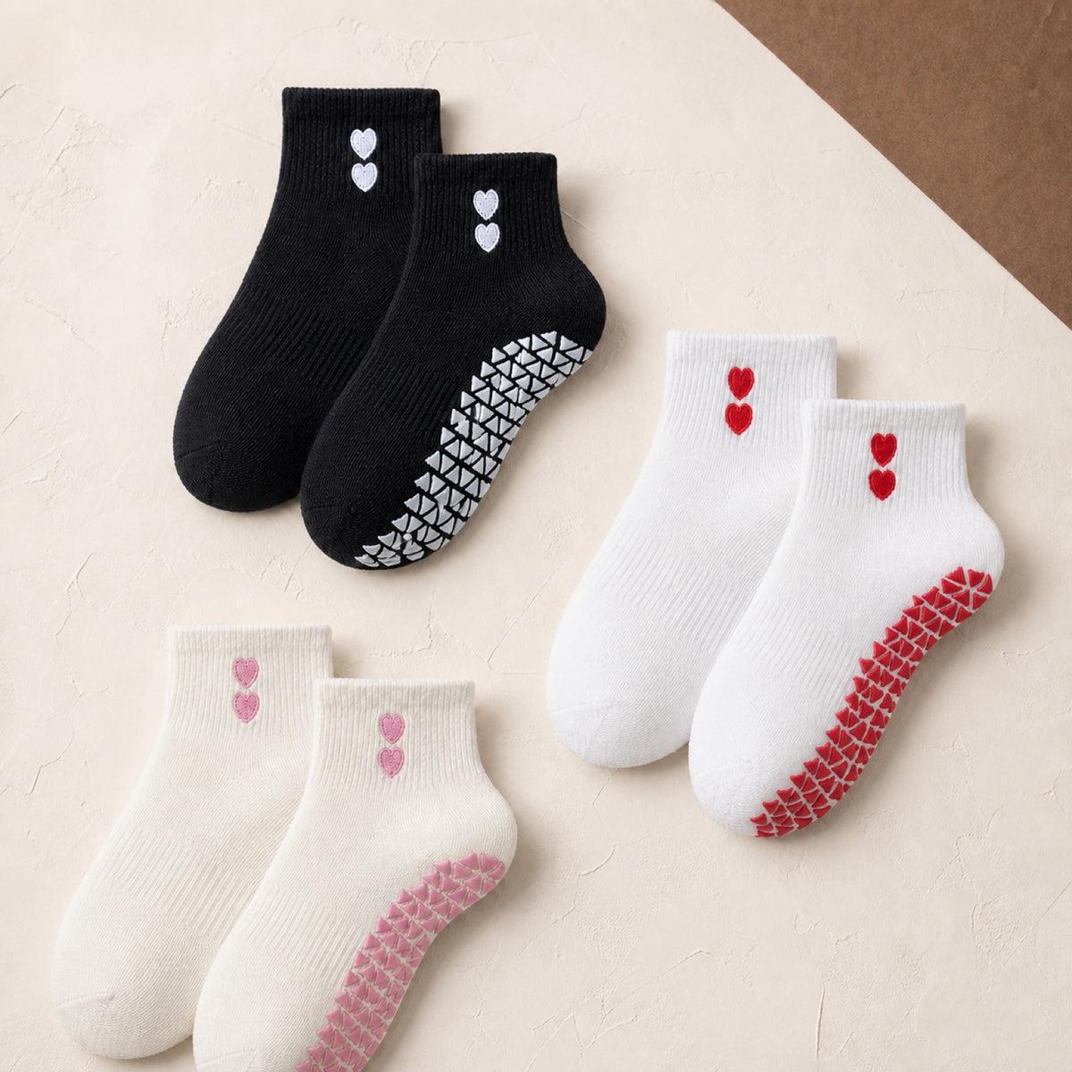 VORTRAY Core Studio Trio grip socks in black, white, and cream