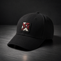Vortray Graphic Patch Cap on a dark steel surface